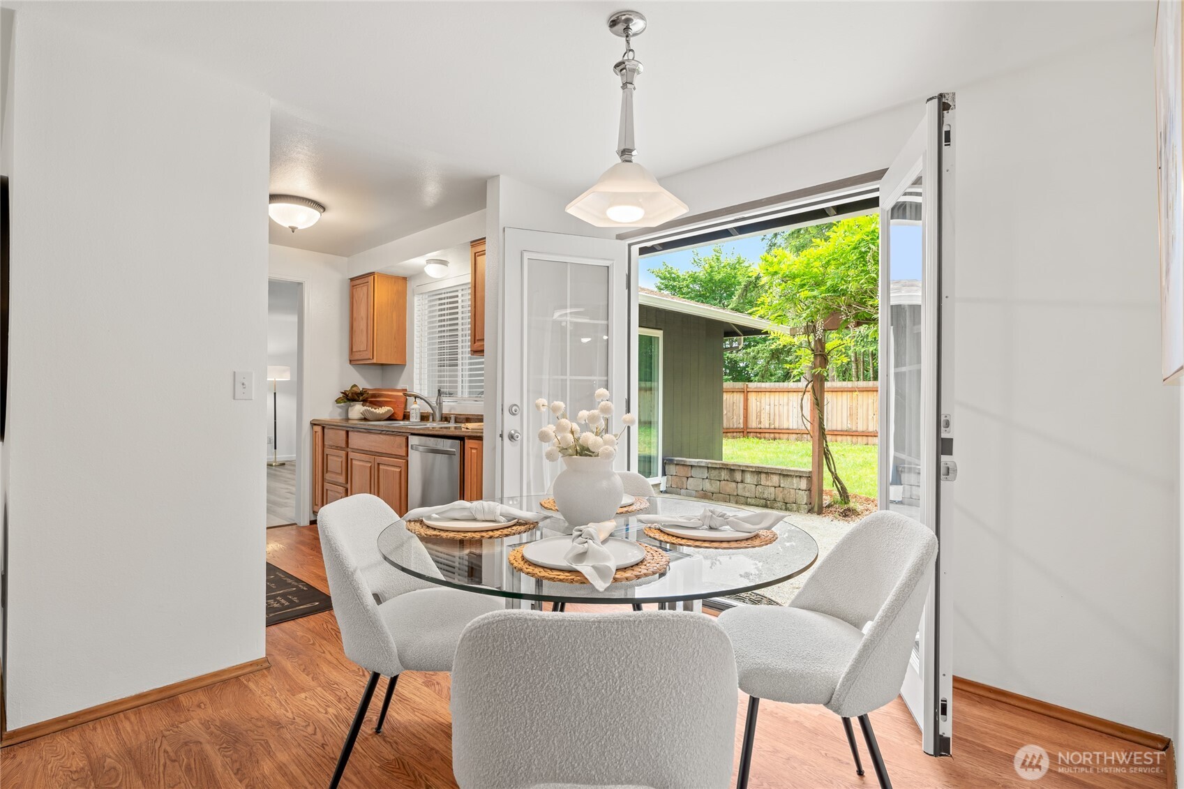 16809 Southeast 149th Street Renton, WA 98059 - Photo 7 of 30 a view of a dining room with furniture window and outside view