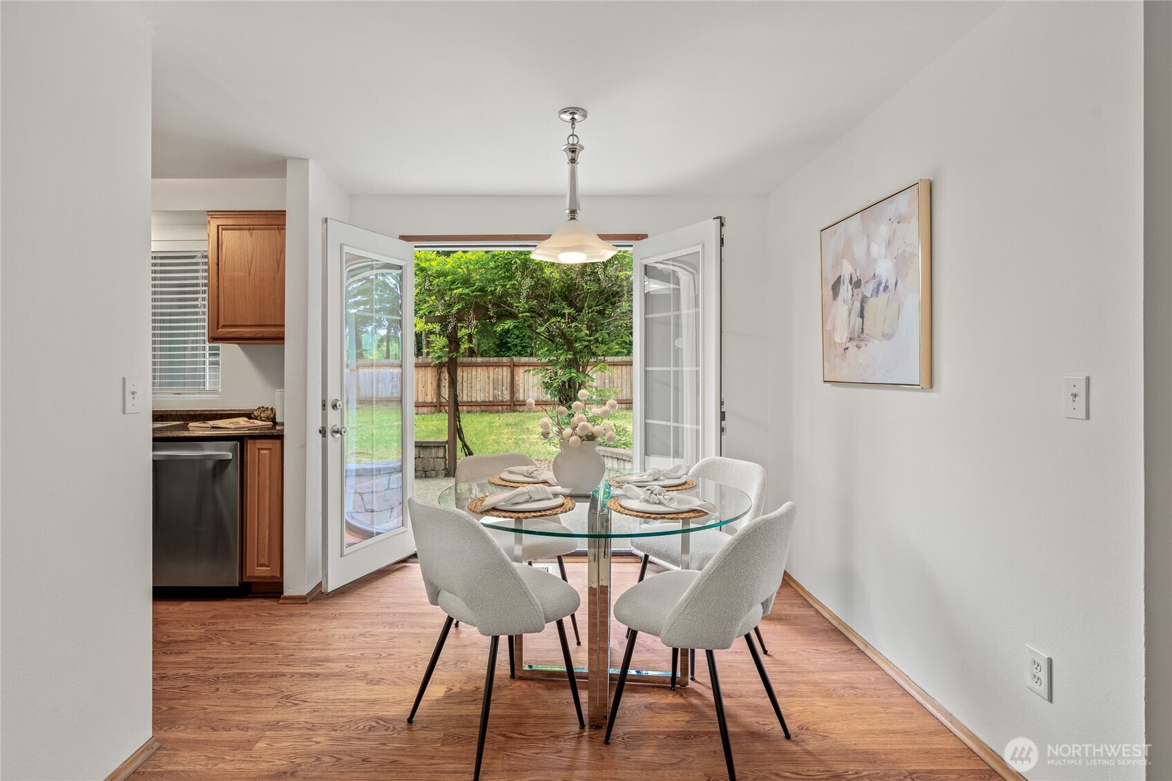 16809 Southeast 149th Street Renton, WA 98059 - Photo 8 of 30 a dining room with furniture window and wooden floor