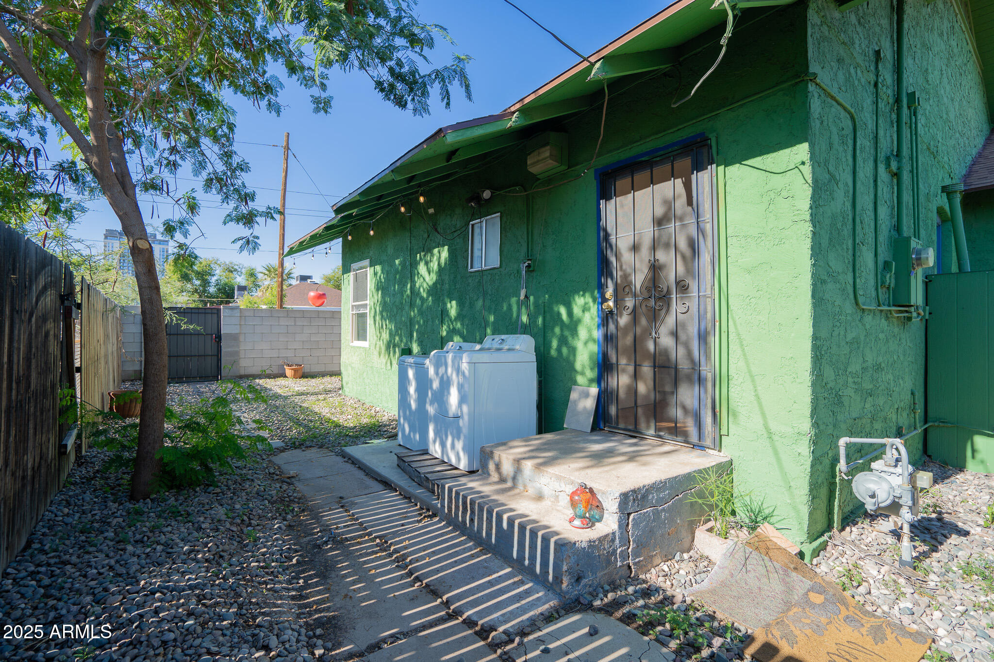 1001 East Garfield Street Phoenix, AZ 85006 - Photo 26 of 27 a view of a house with backyard and sitting area