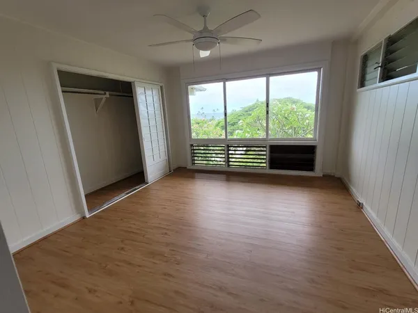 a view of a storage & utility room with a washer dryer