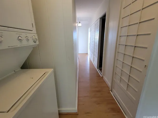a bathroom with a toilet and a tub