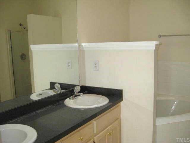 1517 Entheos Lane Raleigh, NC 27610 - Photo 6 of 10 Gorgeous master bath with dual vanity areas, garden tub, & cathedral ceiling with skylight Other