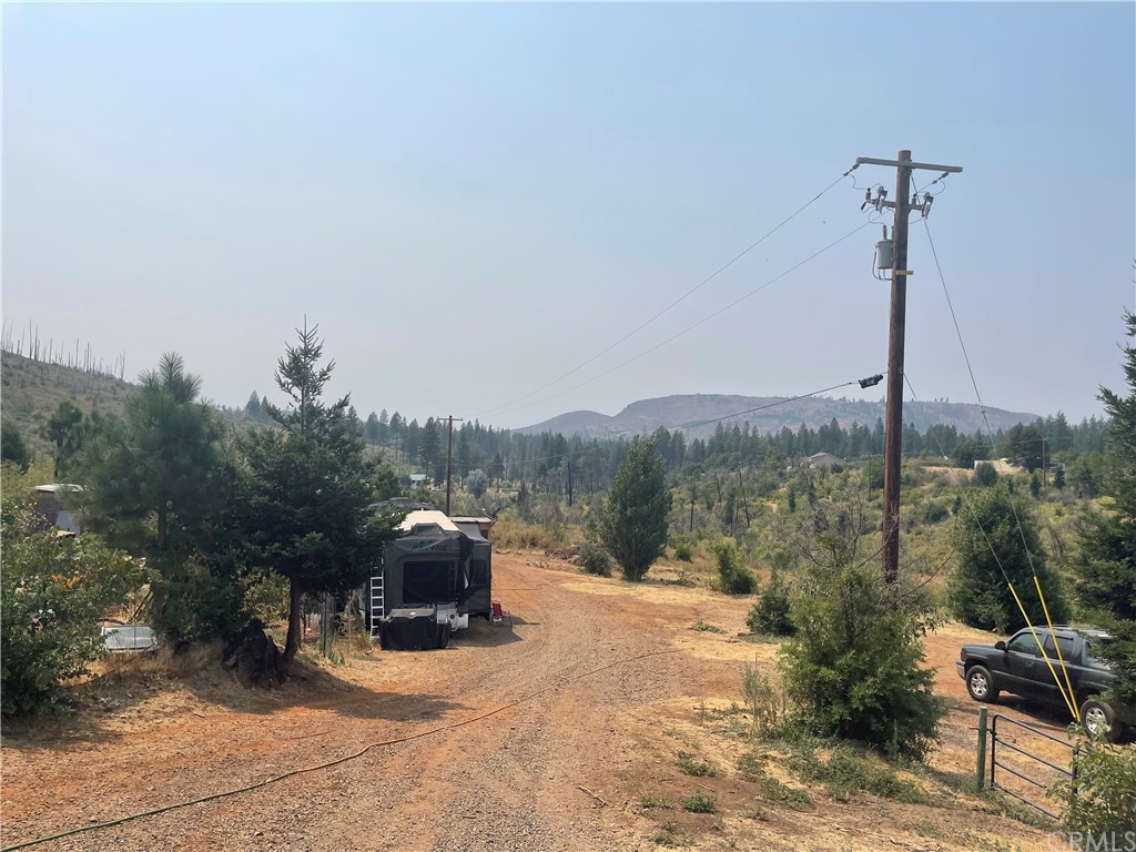 4236 Kakini Road Oroville, CA 95965 - Photo 25 of 36 a view of a terrace with a bench