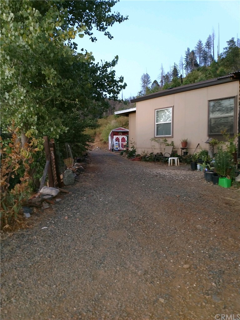 4236 Kakini Road Oroville, CA 95965 - Photo 4 of 36 a view of a house with a street
