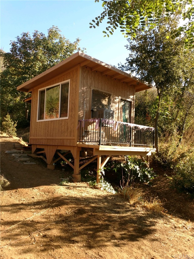 4236 Kakini Road Oroville, CA 95965 - Photo 34 of 36 a front view of a house with a yard