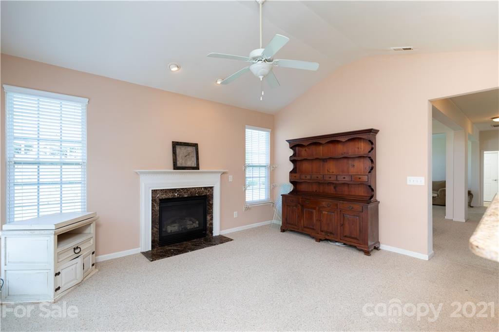 638 Amethyst Circle Fort Mill, SC 29708 - Photo 13 of 38 a room with furniture and a fireplace