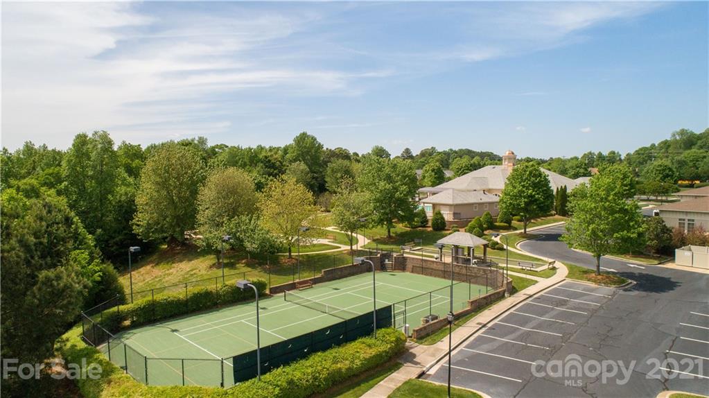 638 Amethyst Circle Fort Mill, SC 29708 - Photo 24 of 38 a view of a swimming pool with a patio and a yard