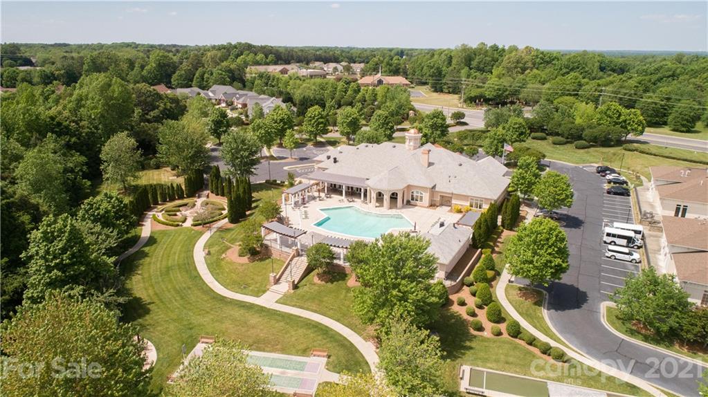 638 Amethyst Circle Fort Mill, SC 29708 - Photo 29 of 38 an aerial view of a house with swimming pool and mountain view