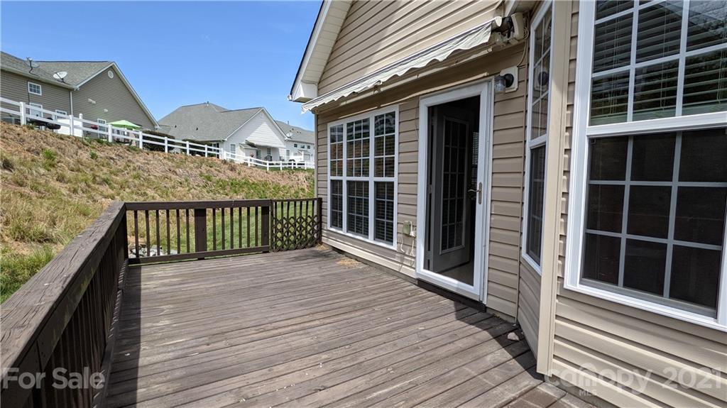 638 Amethyst Circle Fort Mill, SC 29708 - Photo 33 of 38 a view of a balcony with wooden floor and fence