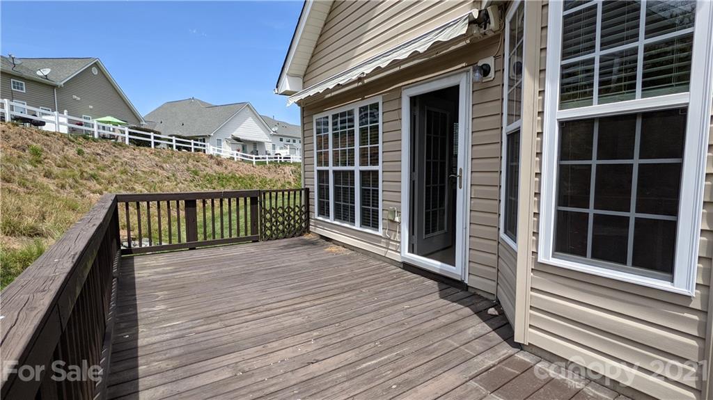 638 Amethyst Circle Fort Mill, SC 29708 - Photo 34 of 38 a view of a balcony with wooden floor and fence