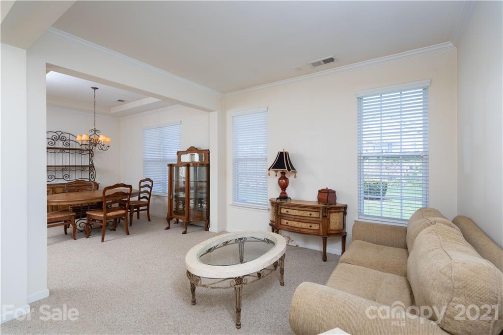 638 Amethyst Circle Fort Mill, SC 29708 - Photo 5 of 38 a living room with furniture and a wooden floor