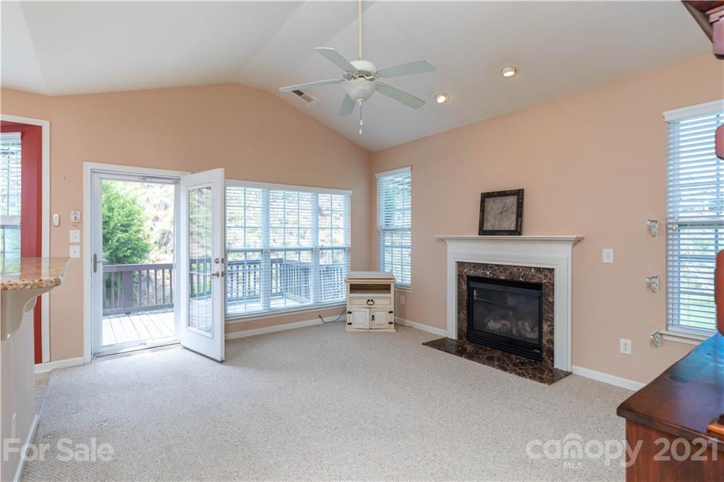 638 Amethyst Circle Fort Mill, SC 29708 - Photo 8 of 38 a living room with furniture and a fireplace