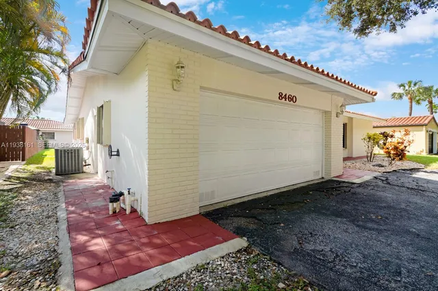 a view of a garden with trees