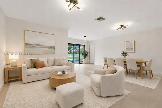 a kitchen with sink a window and cabinets