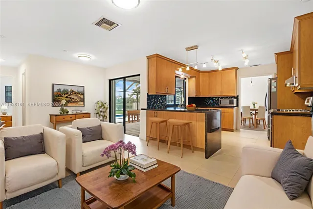 a living room with furniture and a rug