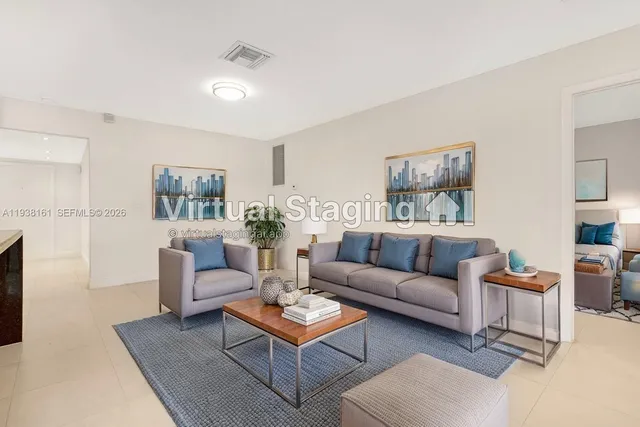 a bedroom with bed and a flat screen tv