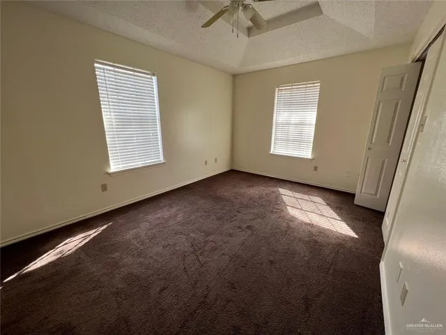 en empty room with windows