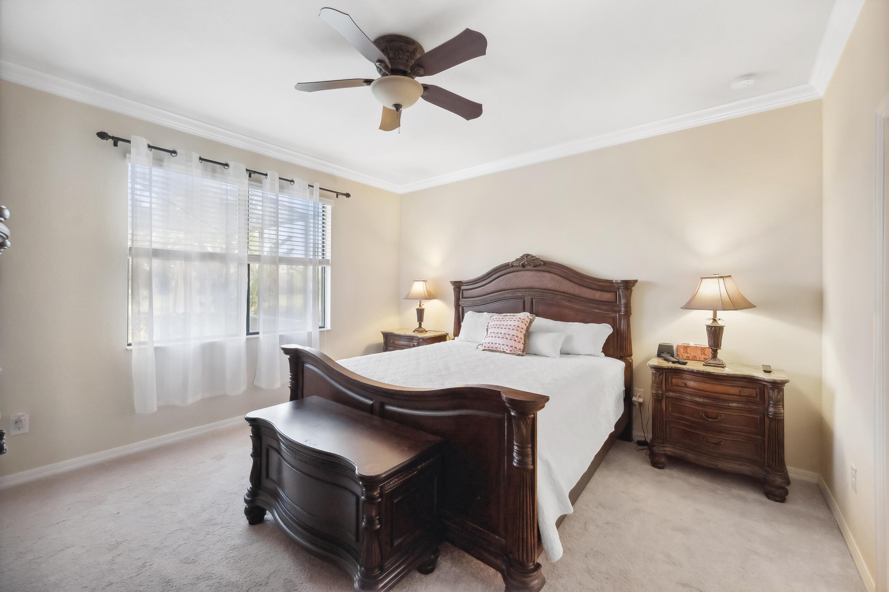 3833 Ruby Way Naples, FL 34114 - Photo 17 of 31 a bedroom with a bed and a window