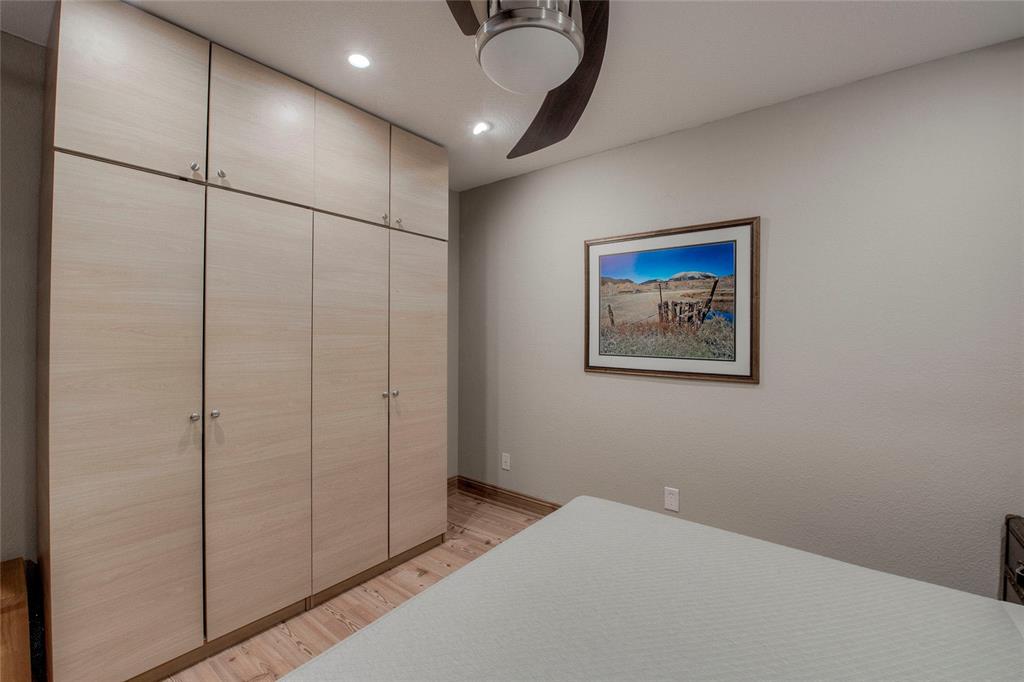 655 4 O Clock Road, Unit 108 Breckenridge, CO 80424 - Photo 15 of 20 a view of a hallway with paintings on the wall