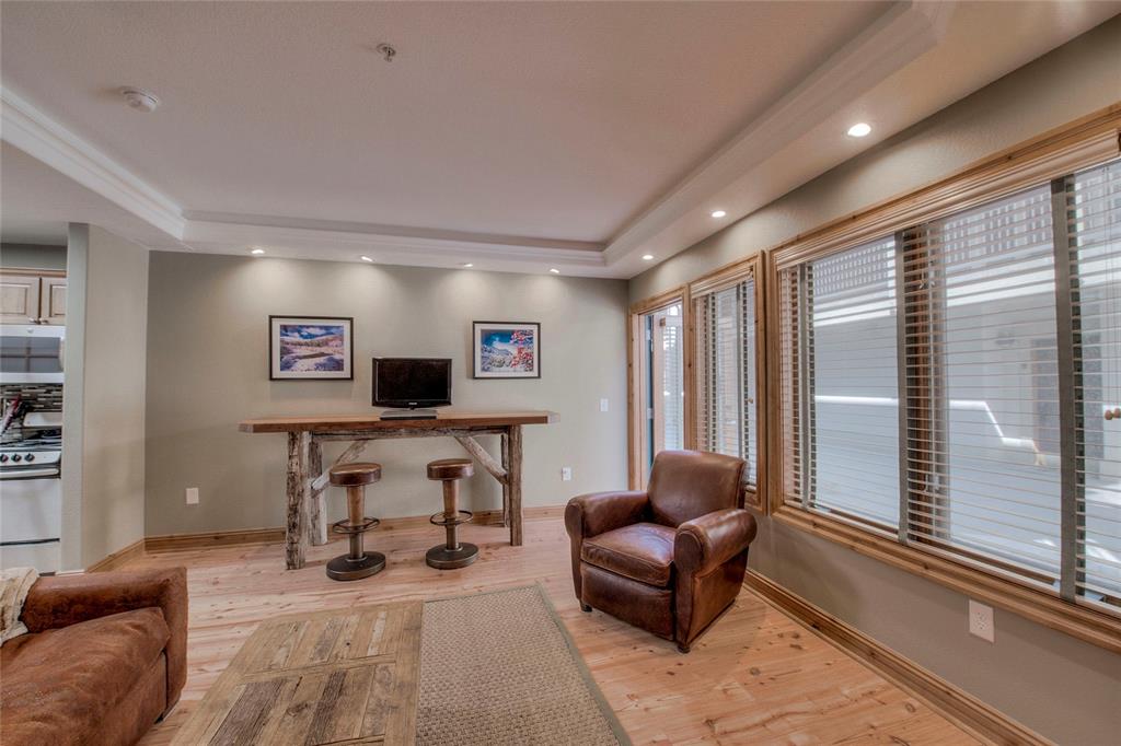 655 4 O Clock Road, Unit 108 Breckenridge, CO 80424 - Photo 6 of 20 a living room with furniture and a window