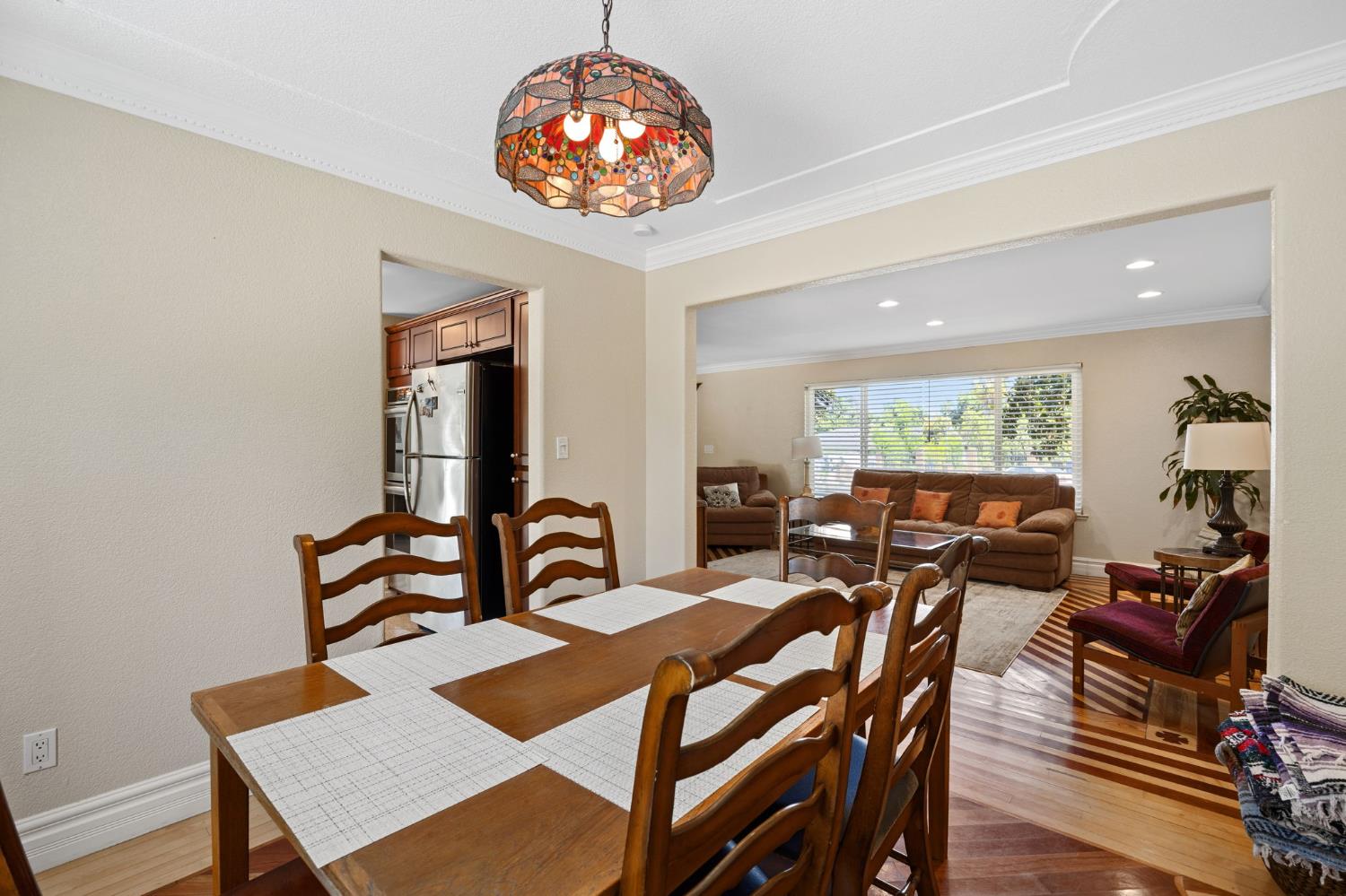 4206 Zephyr Way Sacramento, CA 95821 - Photo 11 of 45 a view of a dining room with furniture and wooden floor