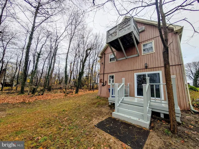 a view of a yard with a slide