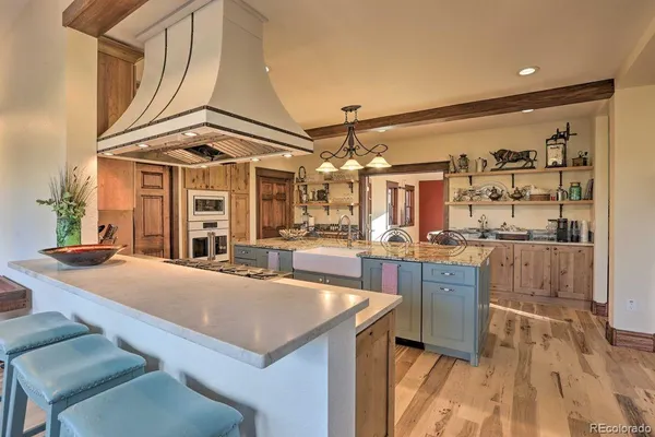 a view of a field with an ocean