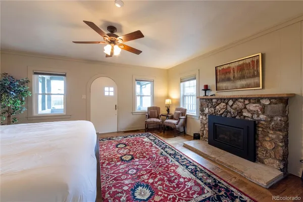 a view of a town with mountains in the background