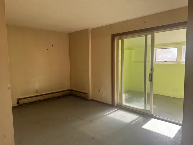 a view of room with window and stairs