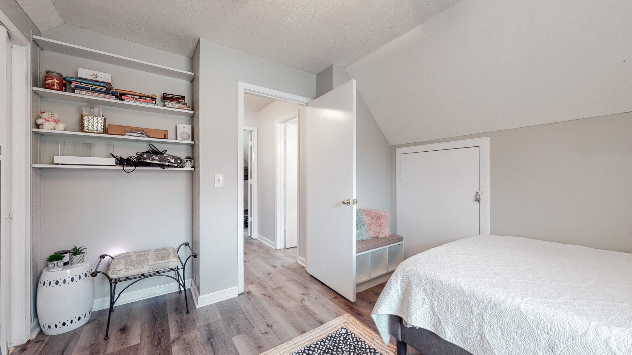 209 Dockside Court Hermitage, TN 37076 - Photo 22 of 43 a bedroom with a bed and wooden floor