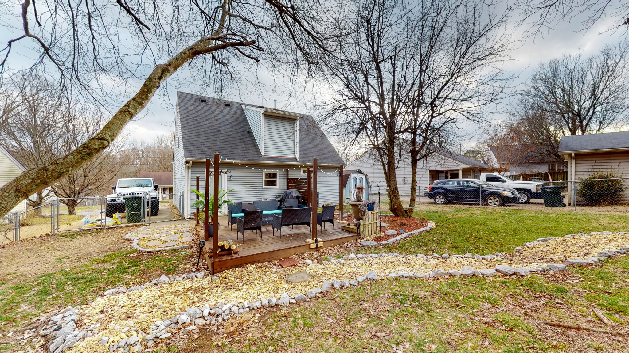 209 Dockside Court Hermitage, TN 37076 - Photo 31 of 43 a front view of a house with a yard and garage