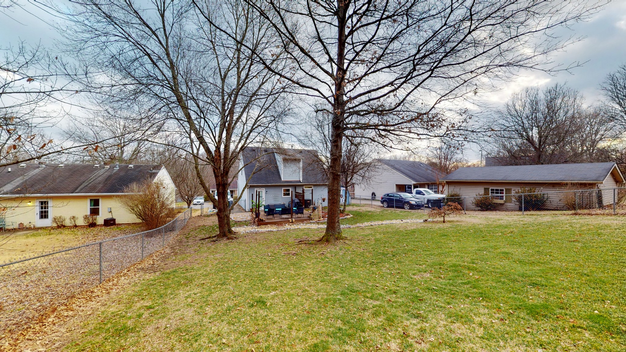 209 Dockside Court Hermitage, TN 37076 - Photo 32 of 43 a view of a yard with a house in the background