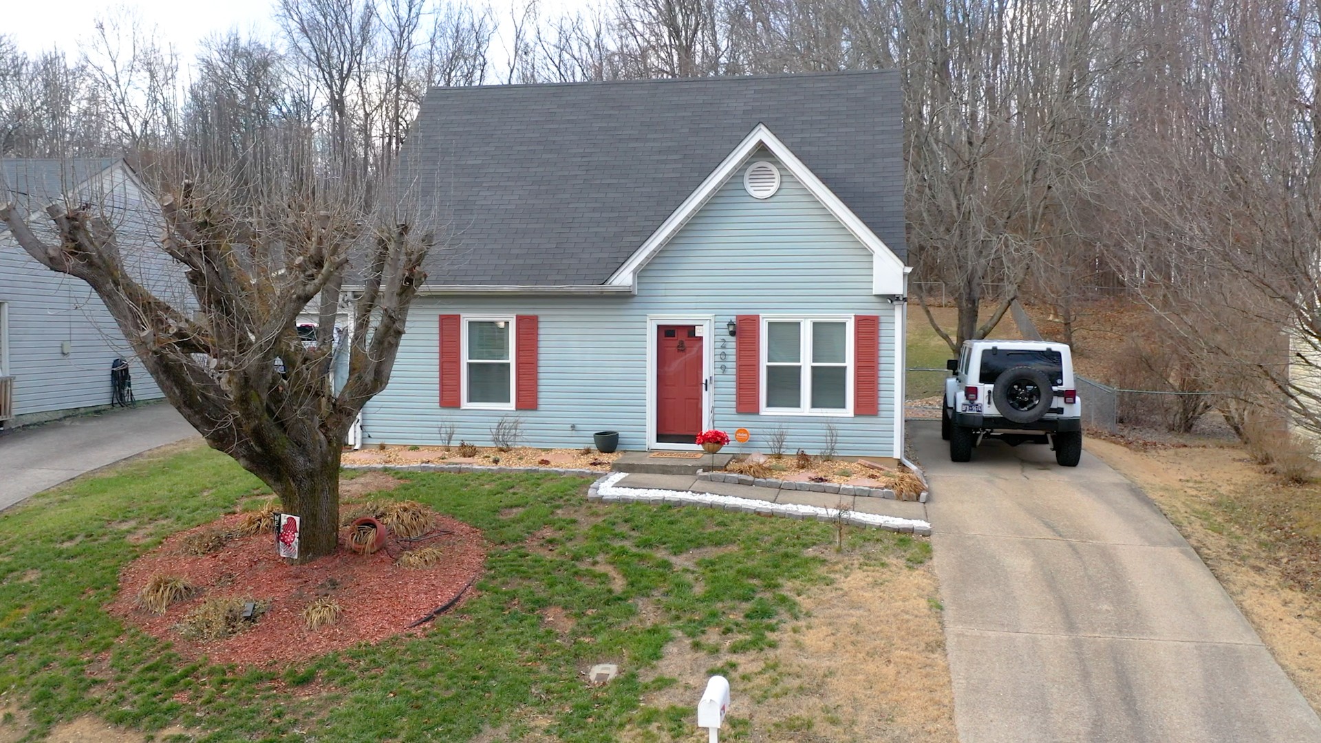 209 Dockside Court Hermitage, TN 37076 - Photo 36 of 43 a front view of a house with a yard