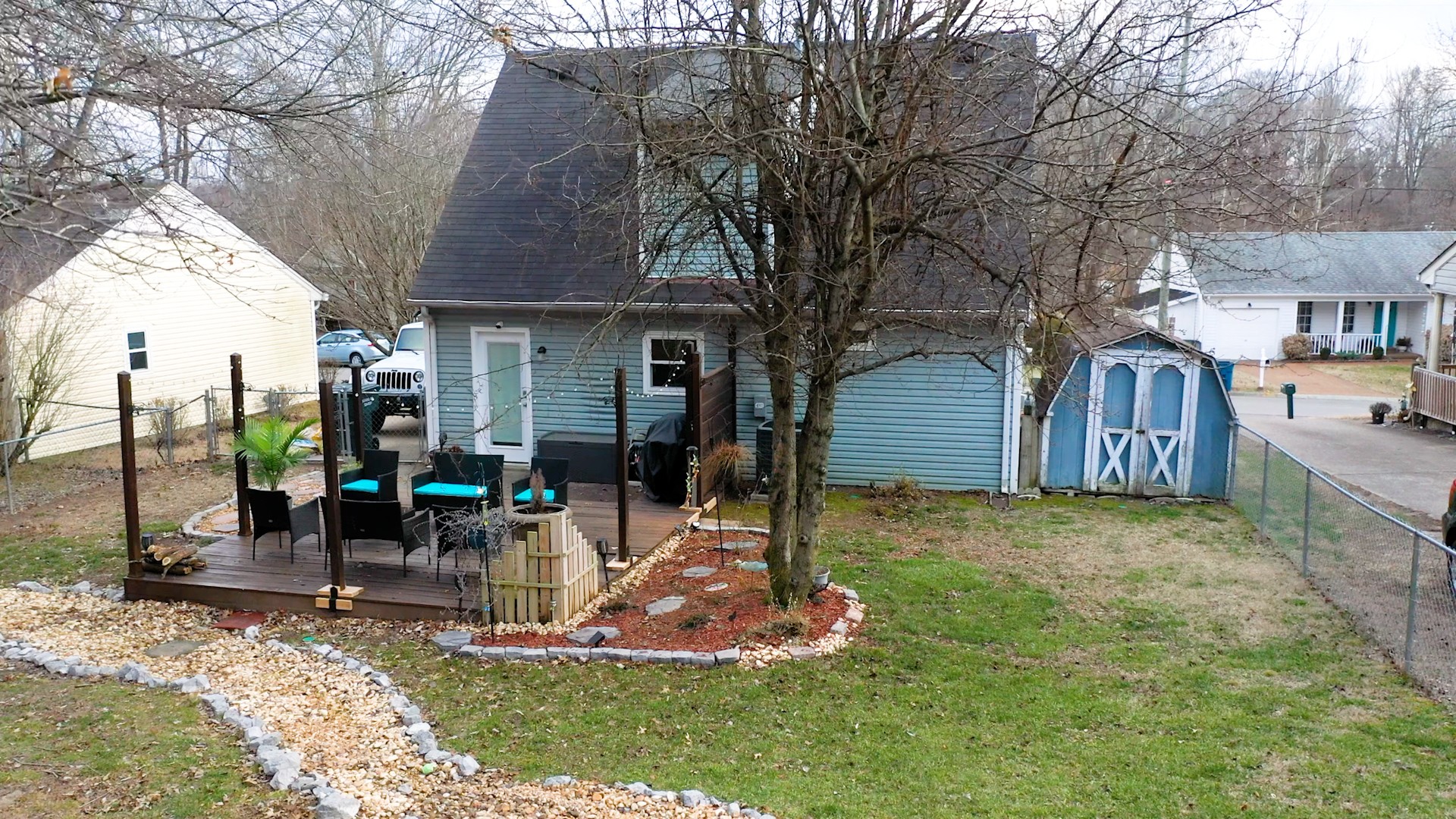 209 Dockside Court Hermitage, TN 37076 - Photo 38 of 43 a backyard of a house with yard table and chairs