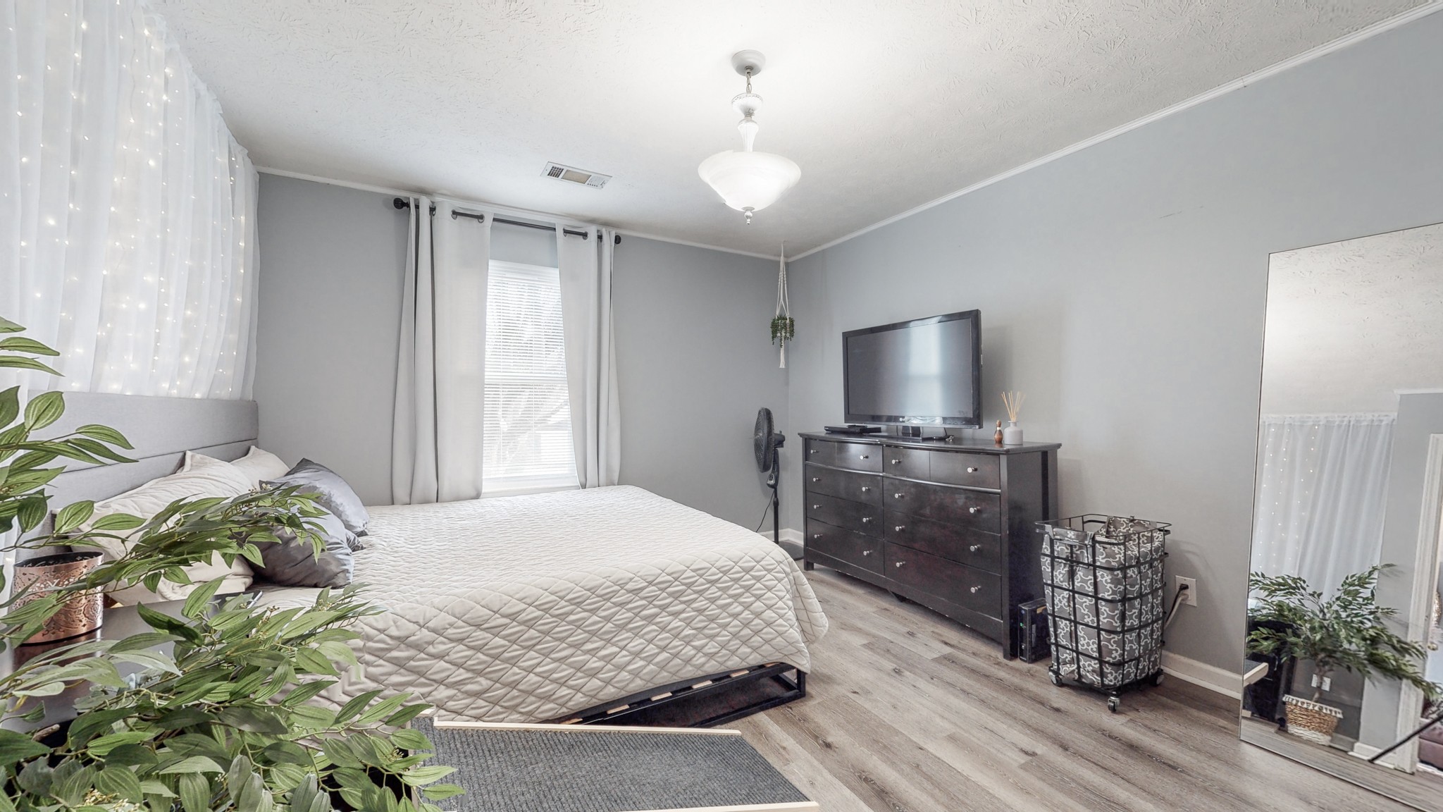 209 Dockside Court Hermitage, TN 37076 - Photo 10 of 43 a bedroom with a bed and a television