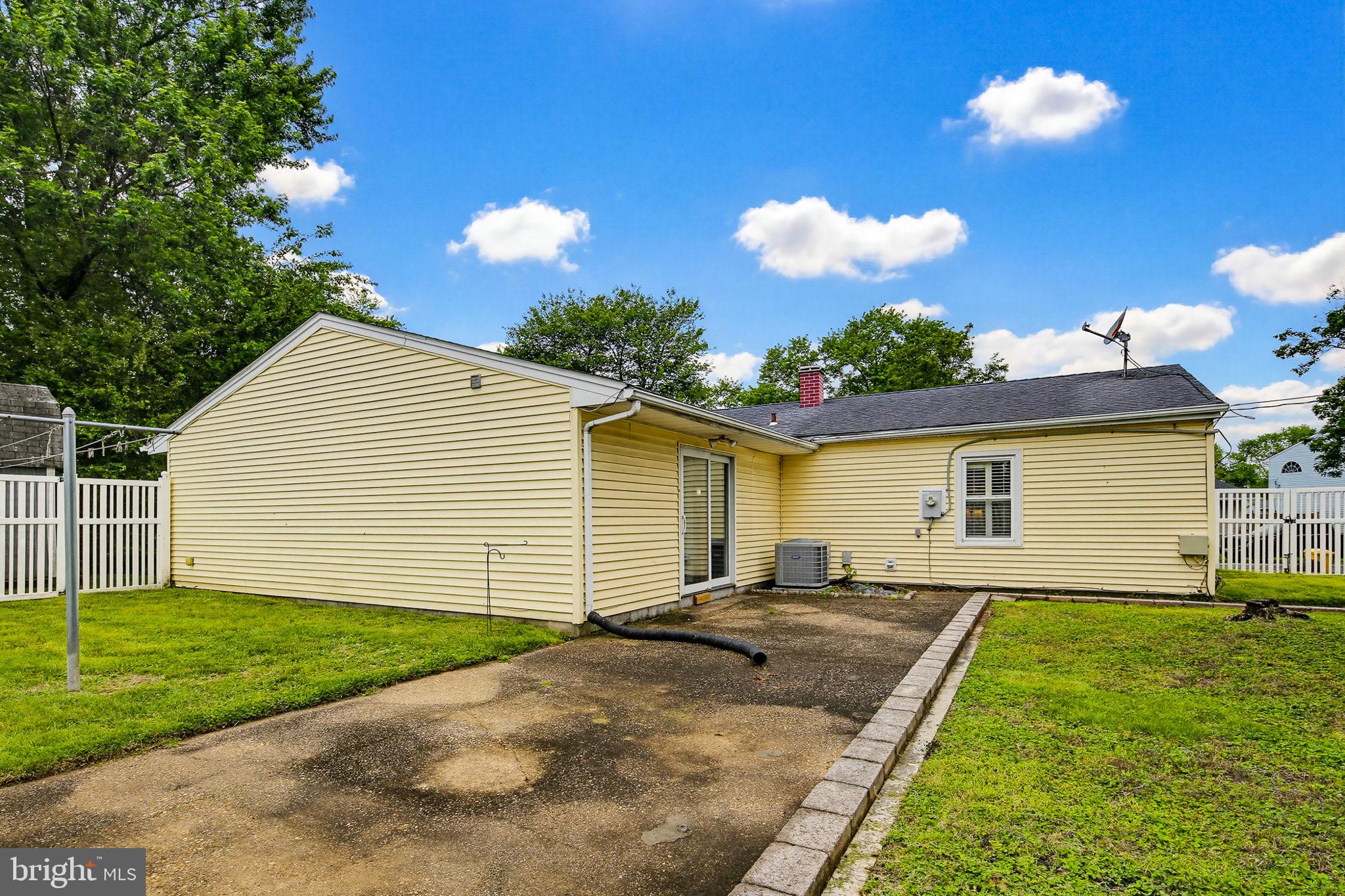 1124 Wynbrook Road Glen Burnie, MD 21060 - Photo 29 of 32 Charming yellow home with spacious yard.