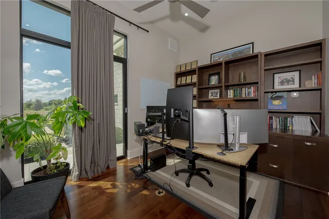 a room with furniture and a potted plant