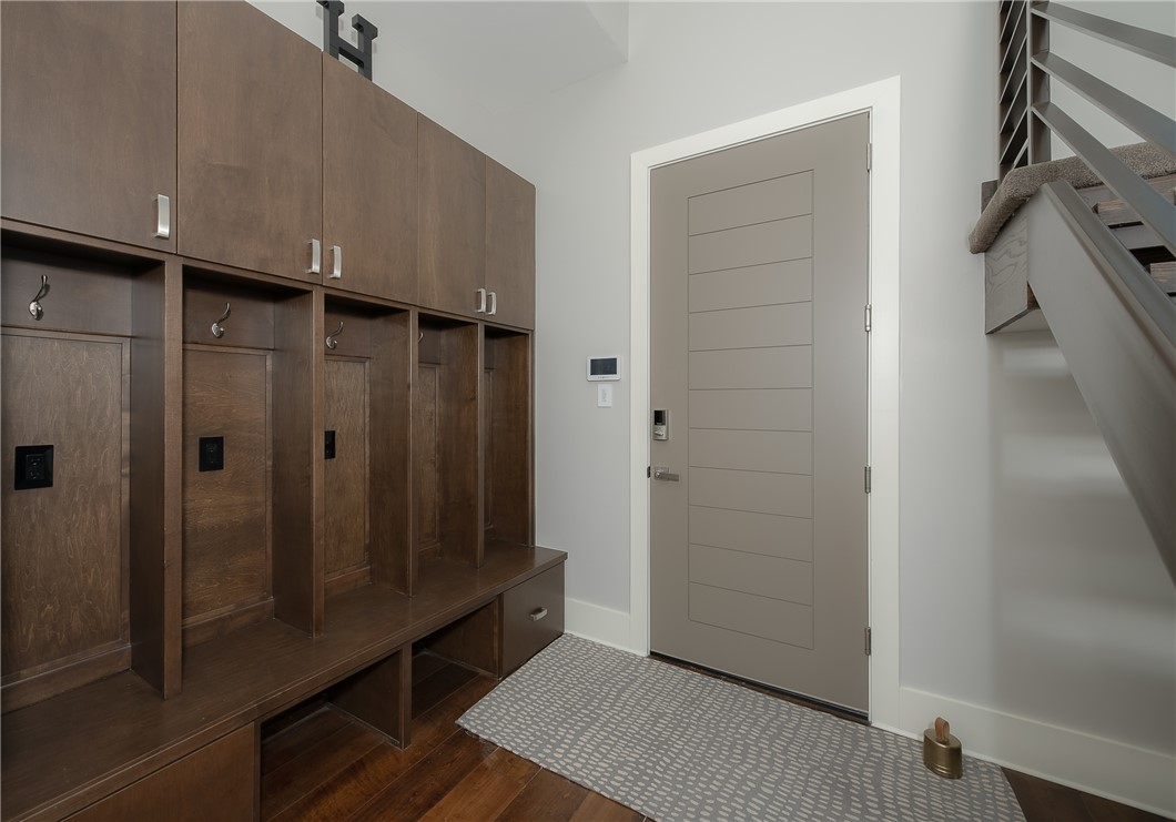 3320 Sycamore Trail Bryan, TX 77807 - Photo 33 of 49 Mudroom featuring dark wood-style flooring and baseboards