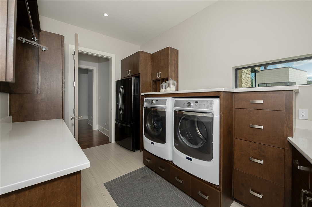 3320 Sycamore Trail Bryan, TX 77807 - Photo 35 of 49 Washroom with separate washer and dryer and cabinet space