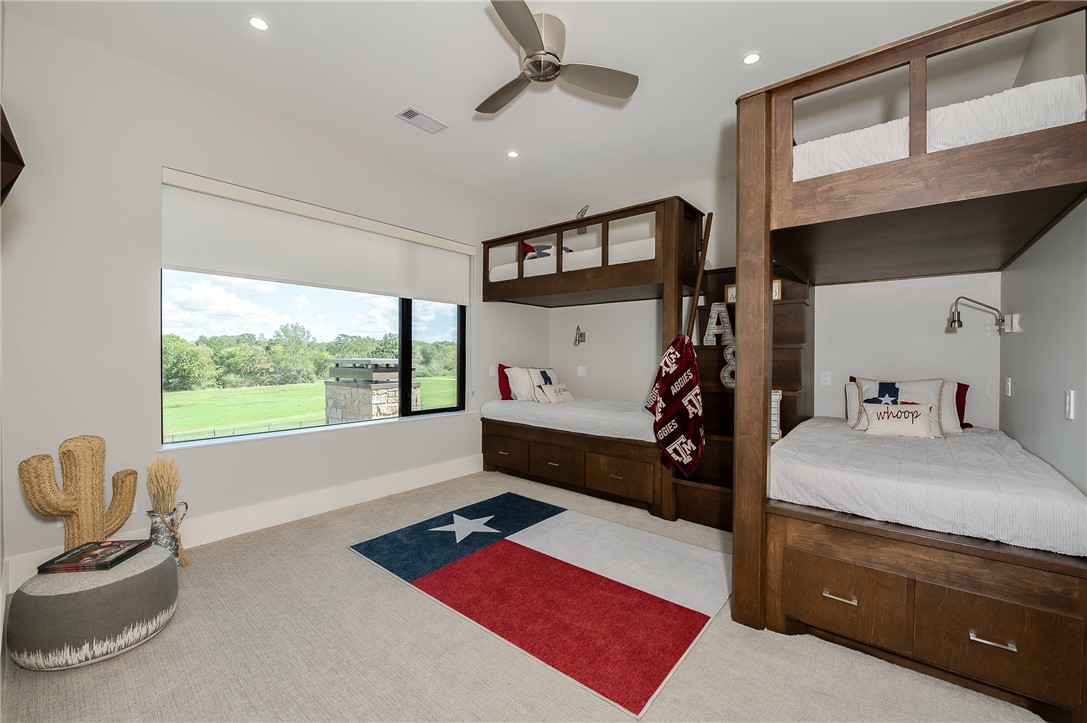 3320 Sycamore Trail Bryan, TX 77807 - Photo 38 of 49 Carpeted bedroom featuring baseboards, ceiling fan, visible vents, and recessed lighting