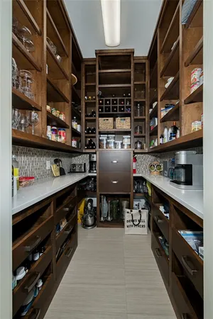 a kitchen with stainless steel appliances granite countertop a stove and a sink