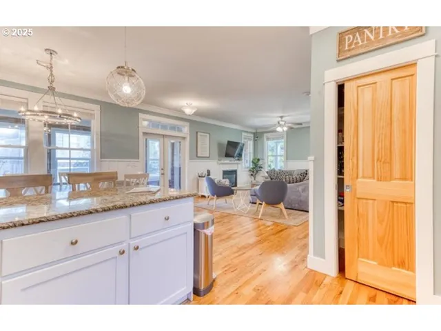 a view of living room and kitchen