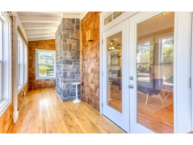a view of entryway with wooden floor