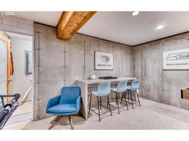 a view of a livingroom with furniture and a chair