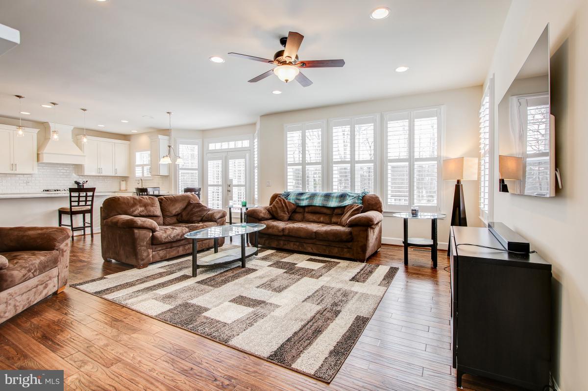 8391 Edward Carr Court Springfield, VA 22153 - Photo 10 of 67 Large open family room with gas fireplace