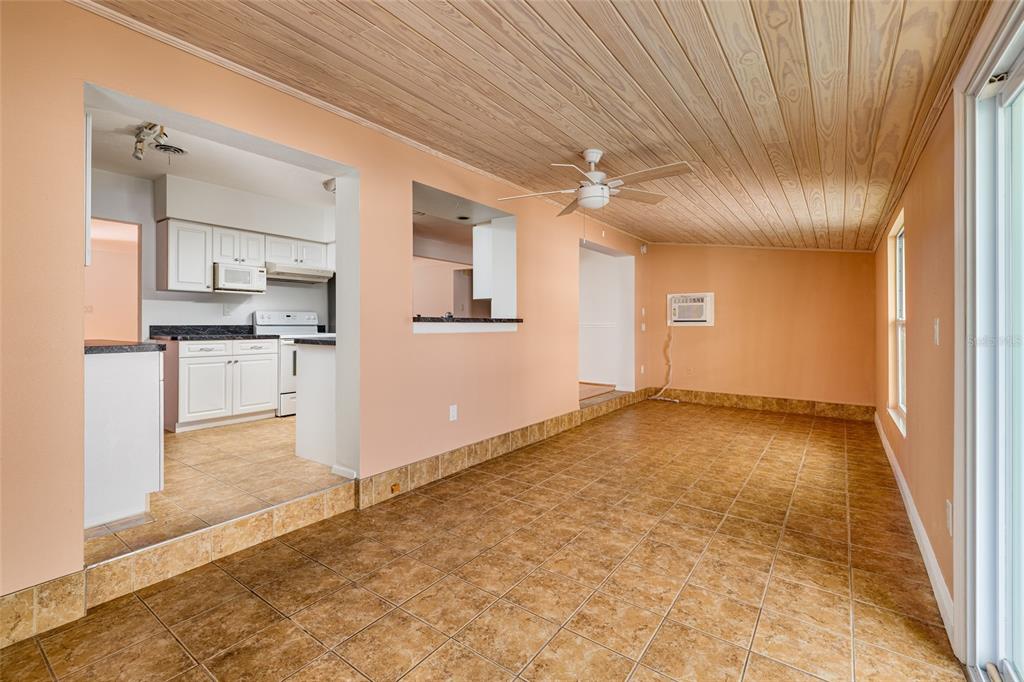 13877 94th Avenue North Seminole, FL 33776 - Photo 14 of 44 a view of a kitchen with a sink and cabinets