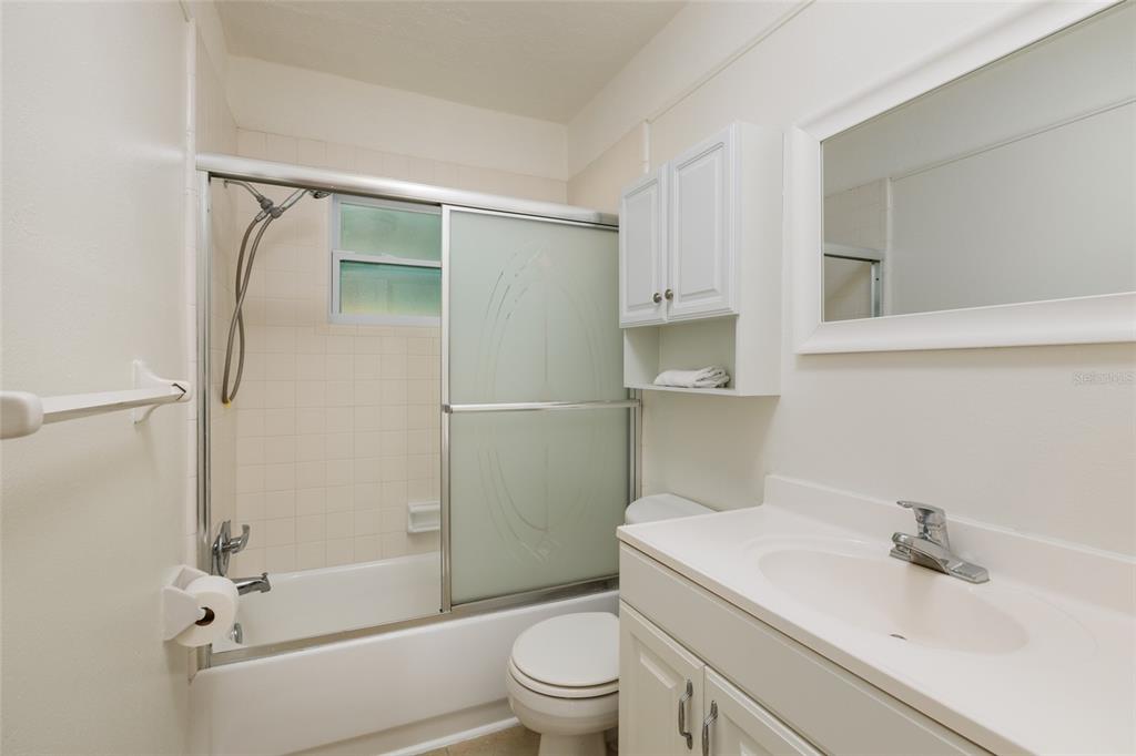 13877 94th Avenue North Seminole, FL 33776 - Photo 20 of 44 a bathroom with a sink toilet and shower