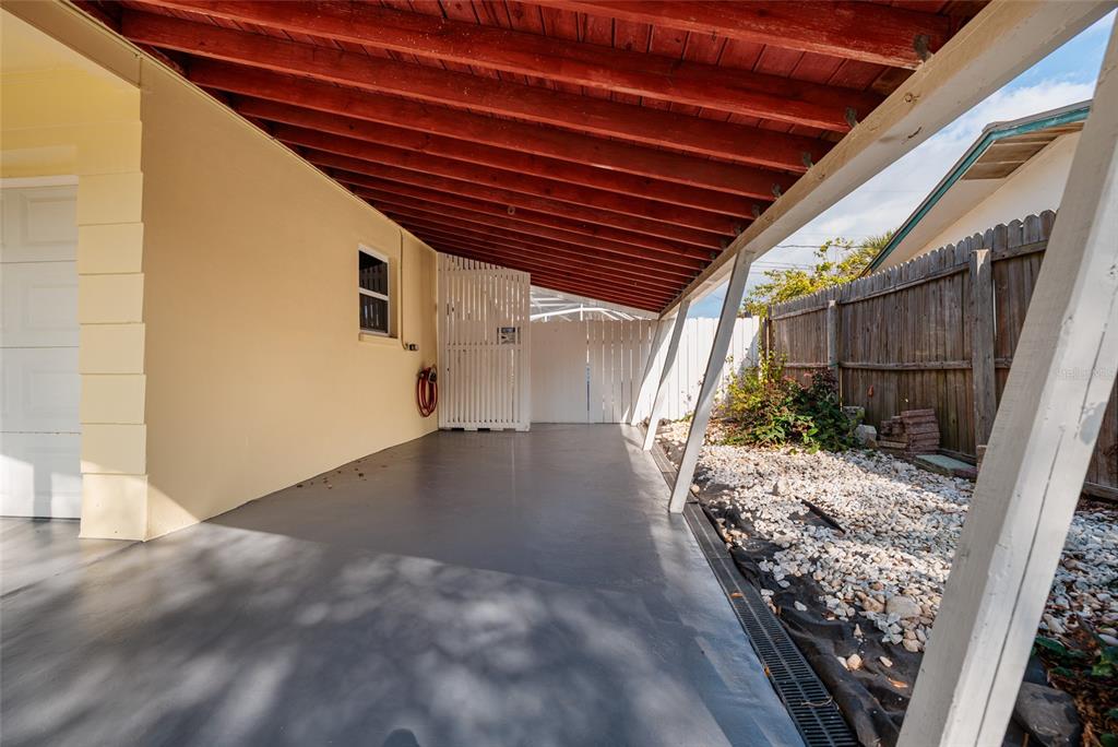 13877 94th Avenue North Seminole, FL 33776 - Photo 23 of 44 a view of a backyard of a house