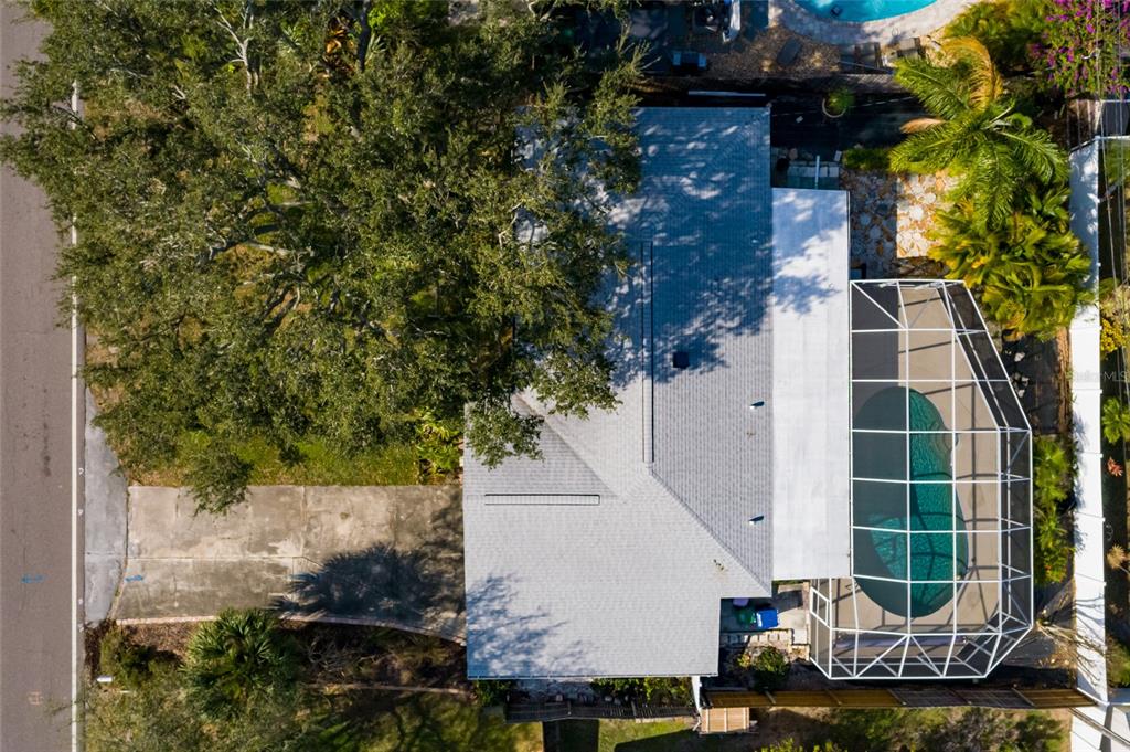 13877 94th Avenue North Seminole, FL 33776 - Photo 32 of 44 front view of a house with a tree