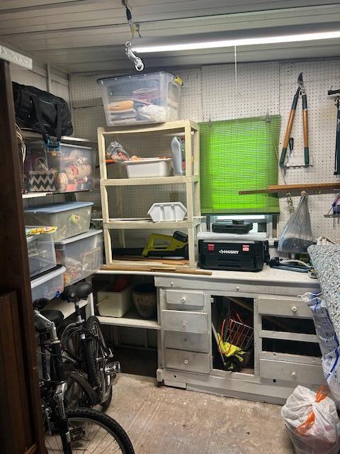 143 Southeast Easy Street Stuart, FL 34994 - Photo 12 of 12 a kitchen with a refrigerator and a stove top oven